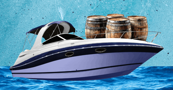 A boat with several bourbon barrels on it.