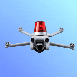 A drone with a flashing red siren light on top.
