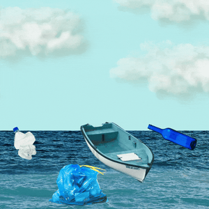 A boat collects trash from the ocean