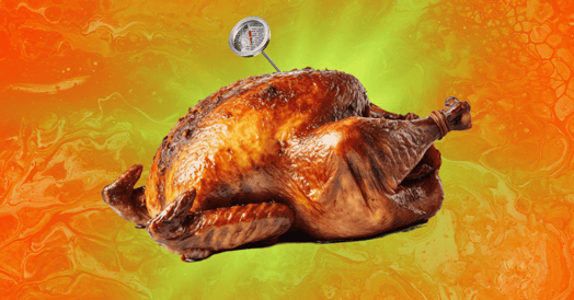 A roasted turkey with a thermometer sticking out its top.
