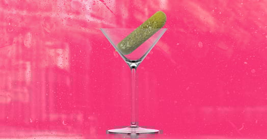 A pickle in a martini glass.