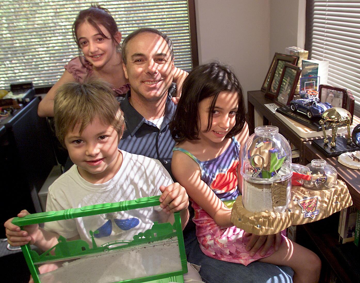Steven Levine and his family showing their ants
