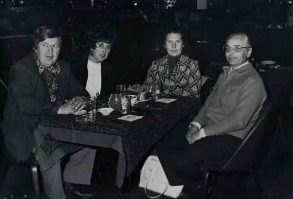 Bob Nichols sitting at a table with family in 1972