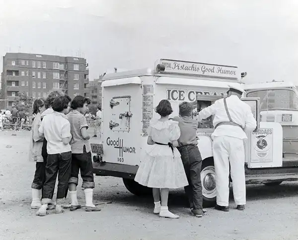 children swarming an ice cream truck