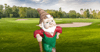 A garden gnome on a golf course.