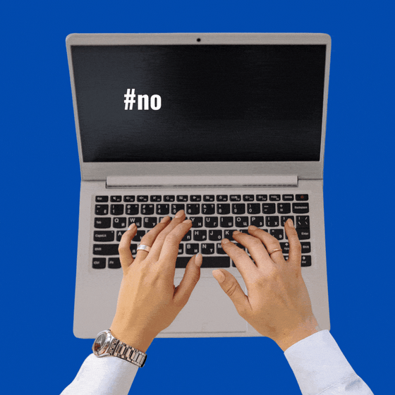 Hands type #nodaysoff on a laptop computer