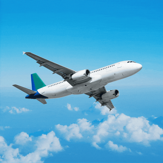 A passenger jet flying across the sky.