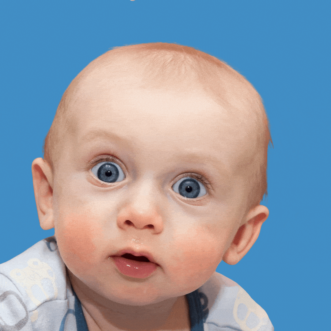 A white baby with blue eyes blinking.