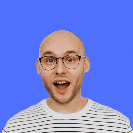 Blonde hair grows on a formerly bald man with a surprised expression on his face.