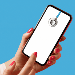 Two hands hold a smartphone. On the screen, a stethoscope drops into a red heart.