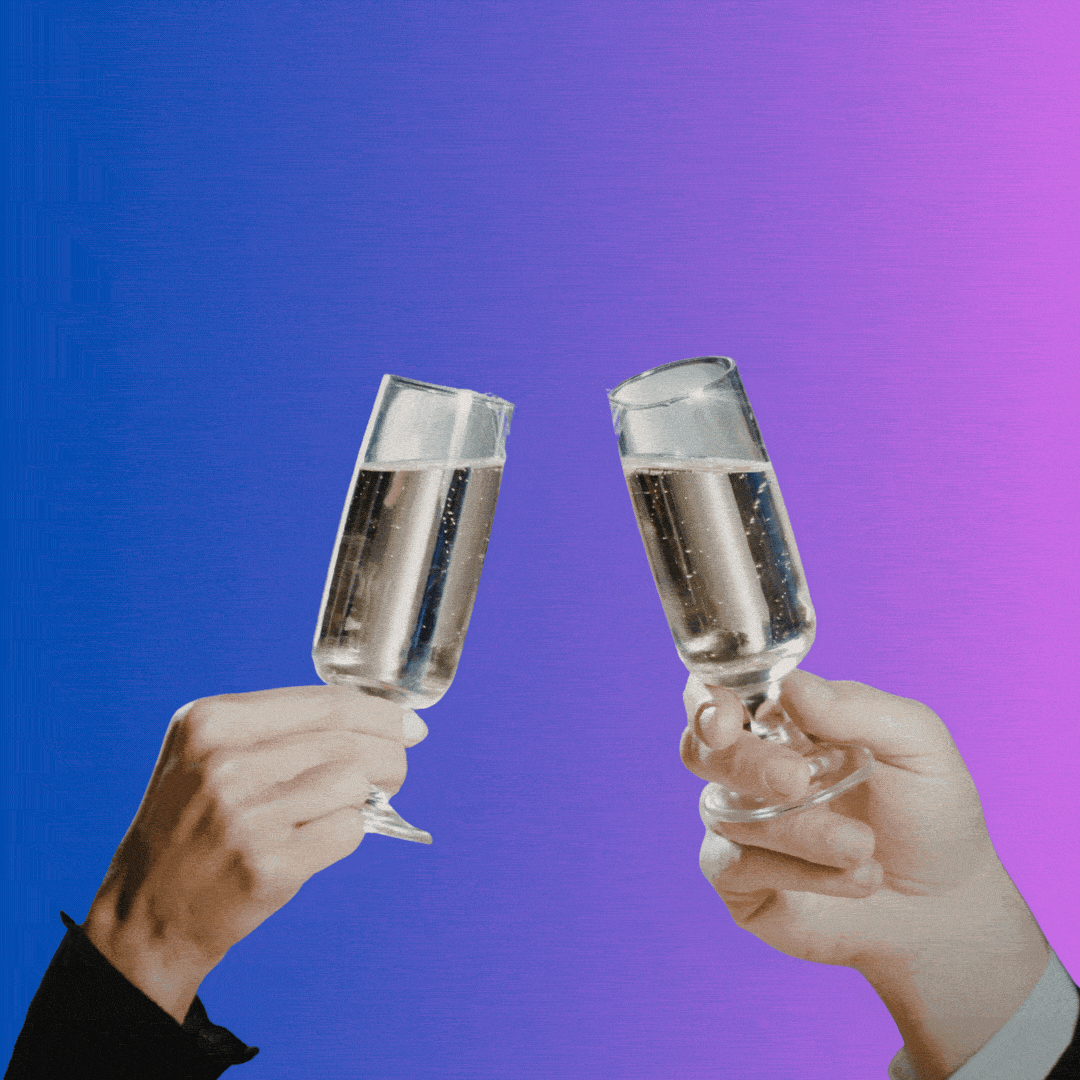 Two hands clink champagne glasses. 