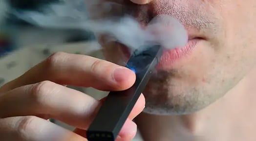 As lawsuits continue, Juul takes another huge hit of funding to expand abroad