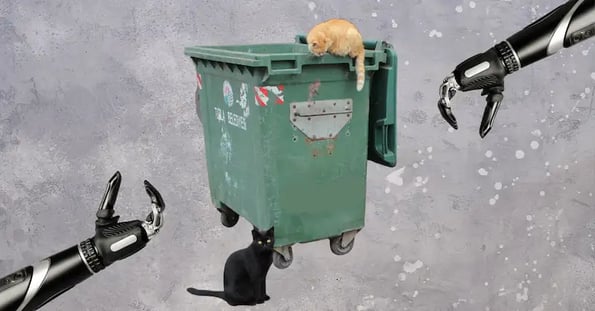 An orange cat and a black cat hang around a green dumpster. Two robot hands reach toward the dumpster.
