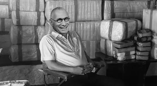 Former president of ESPN says his abrupt exit was tied to an extortion attempt