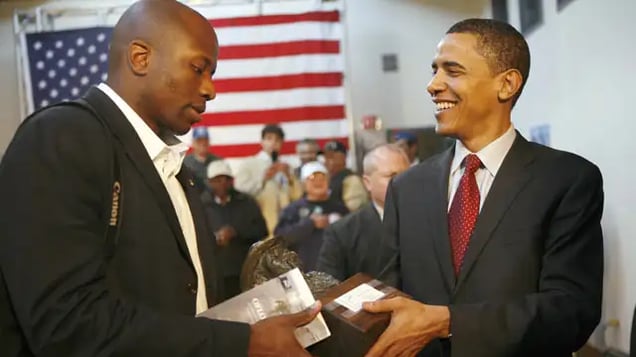 President Obama with his assistant, Reggie Love.
