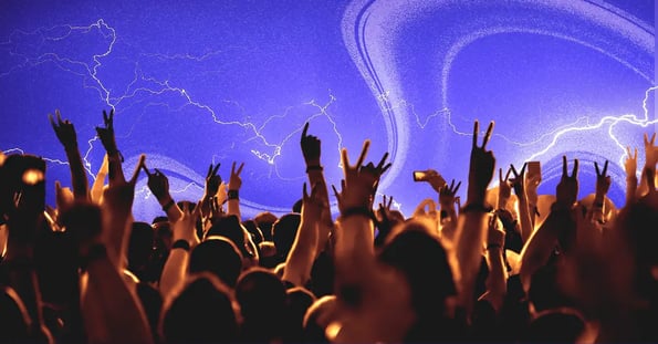 The silhouette of a concert crowd against a purple background with lightning.