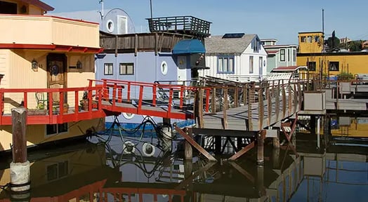 To avoid drowning in big-city rental payments, people are living on boats