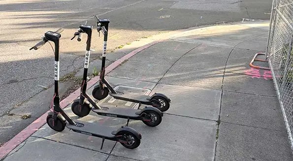 Two guys with a flatbed truck have become dockless scooters’ worst nightmare