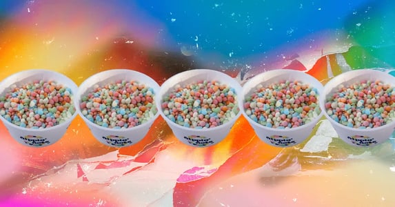 Five mirrored cups of beaded ice cream against a rainbow-colored background.