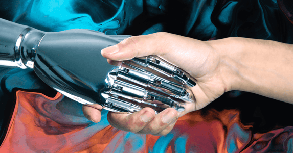 A white human hand-shaking a silver robot hand on a multicolor swirled background.