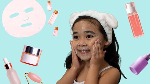 A young girl applying skincare to her face surrounded by skincare products.