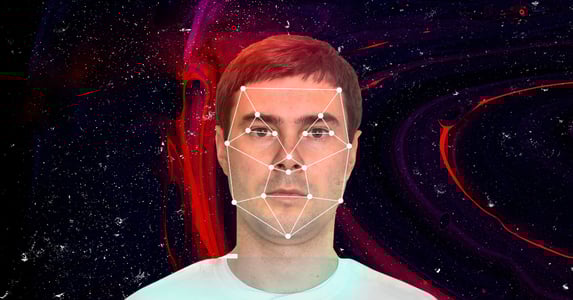 A man in a white T-shirt with facial recognition dots mapping his face.