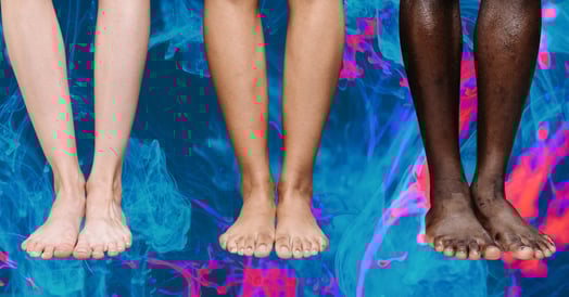 Three pairs of legs and feet against a blue and pink background.