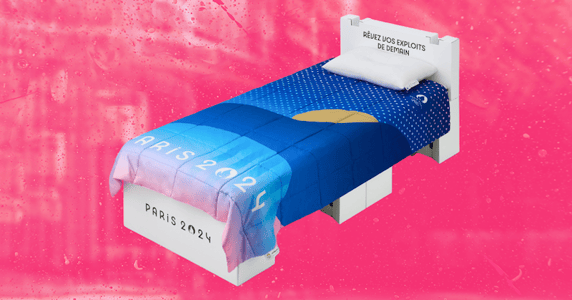 An Airweave bed with a Paris Olympics blanket.